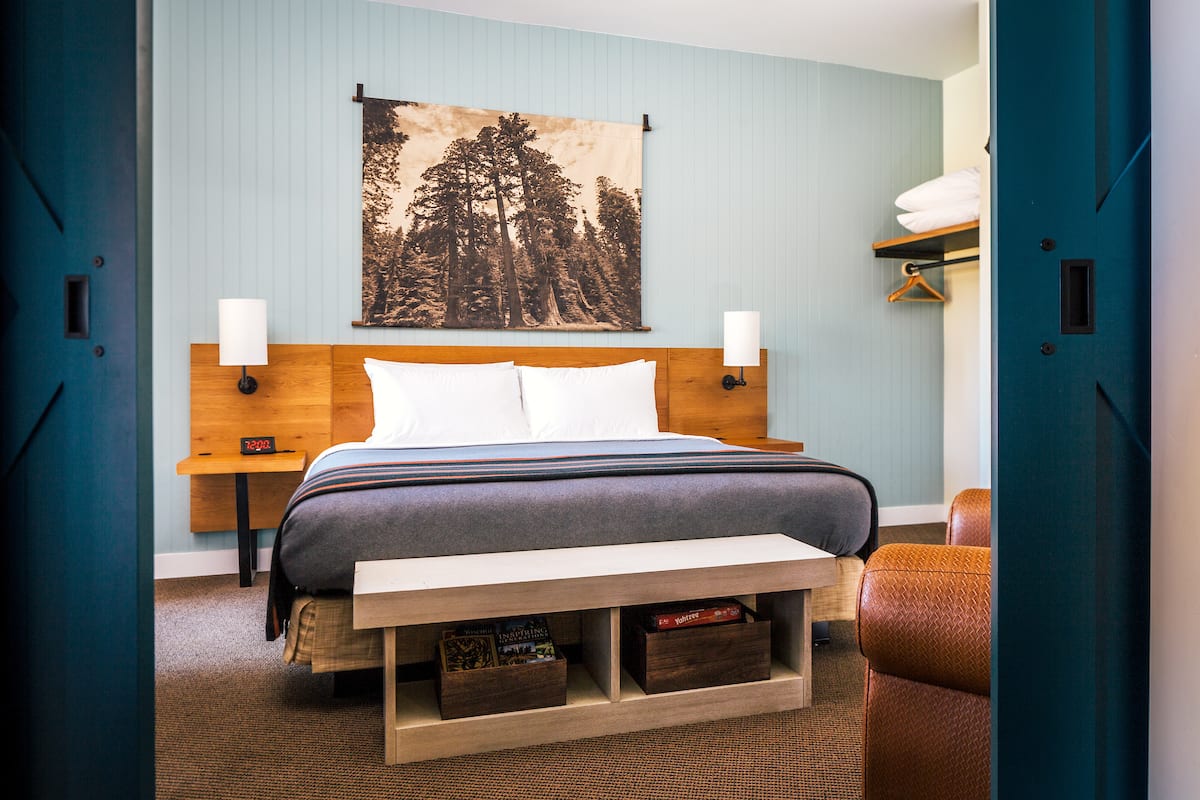 Rush-Creek-Lodge-Suite-Bedroom-and-Barn-Doors-Kim-Carroll